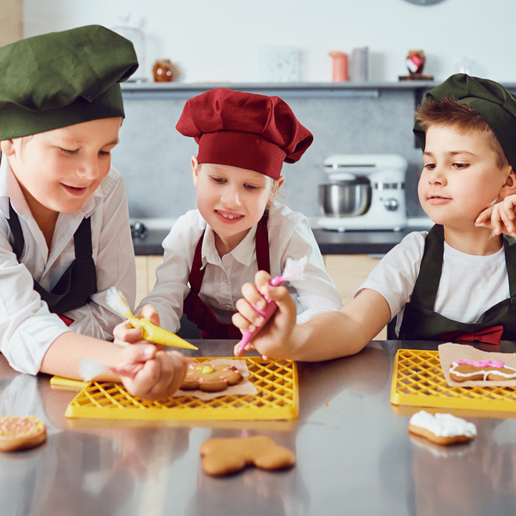 Children decorating cookies.