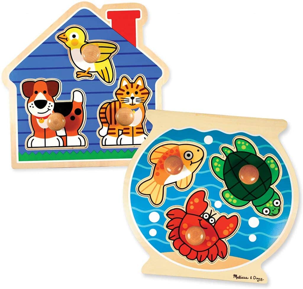 Picture of 2 large knob puzzle with duck, dog and cat in one and fish, turtle and crab in the other.